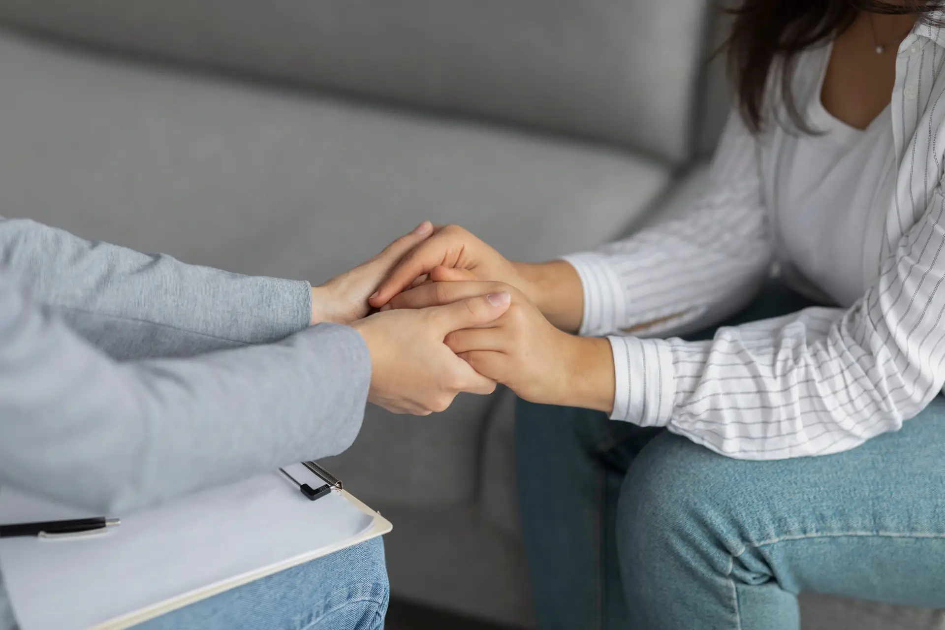 Wellness with Precise. Provider holding hands with Patient.