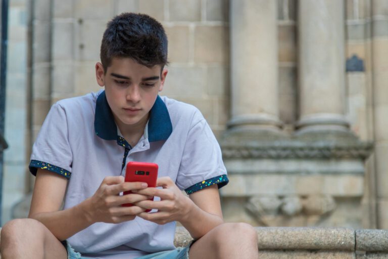 Young teen on phone