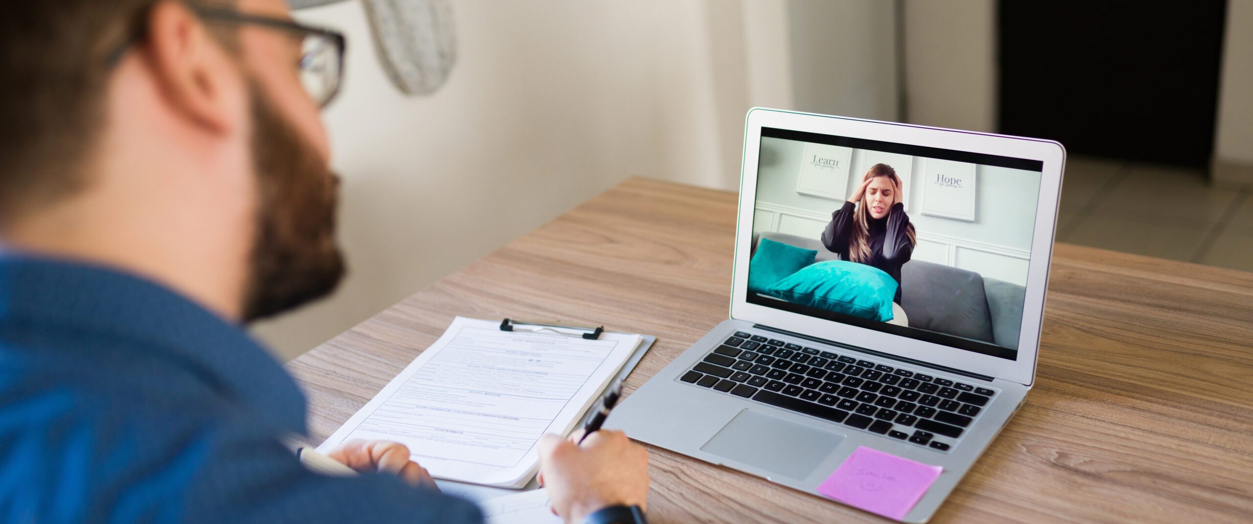 Provider talking to client on video conference.